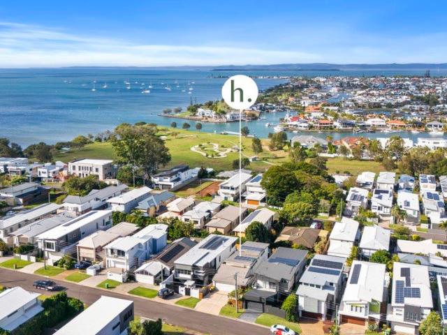 Elevated Bayside Living with Water Views and Exceptional Entertaining