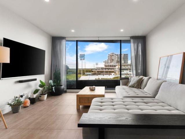 Elevated Bayside Living in a Premier Lifestyle Address