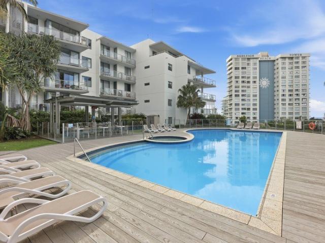 Elevated Beachside Living with Resort Style Amenities