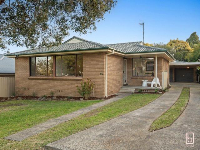 Elevated Brick & Tile Home with Exceptional Garaging