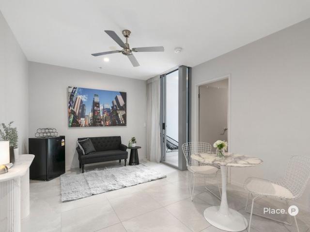 ELEVATED CBD LIVING WITH DOUBLE BALCONIES
