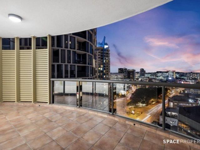 Elevated City Living with Expansive Balcony & Views