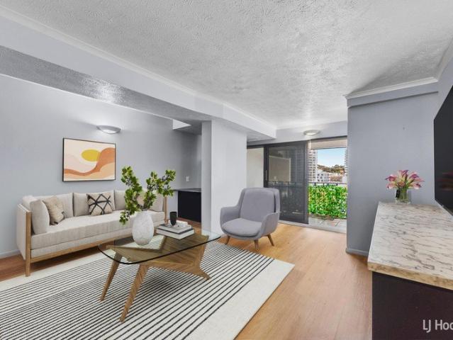 Elevated City Living with Uninterrupted Castle Hill Views