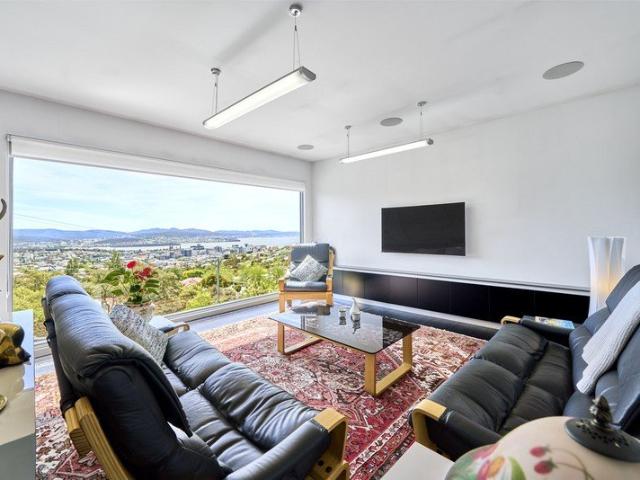 Elevated Contemporary Living With Panoramic City & Water Views