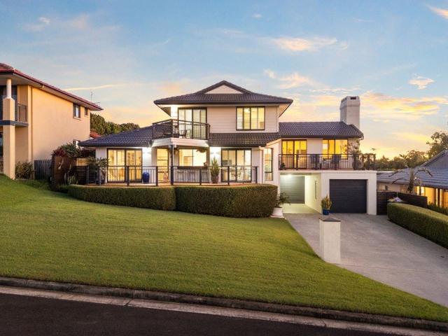 Elevated coastal family home with sweeping ocean views