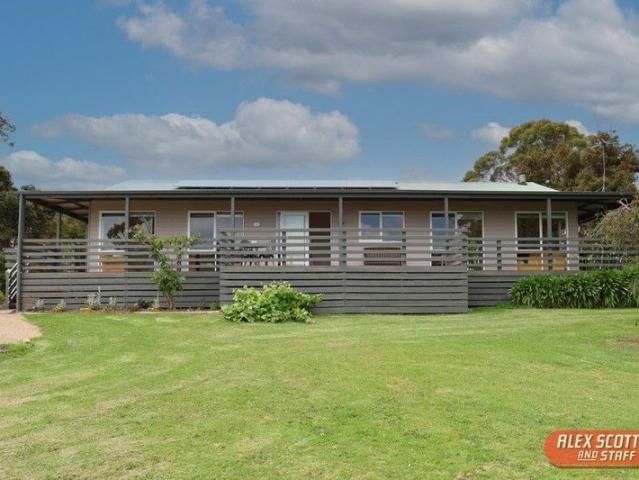 Elevated Coastal Family Retreat with Panoramic Views on Nearly 1 Acre