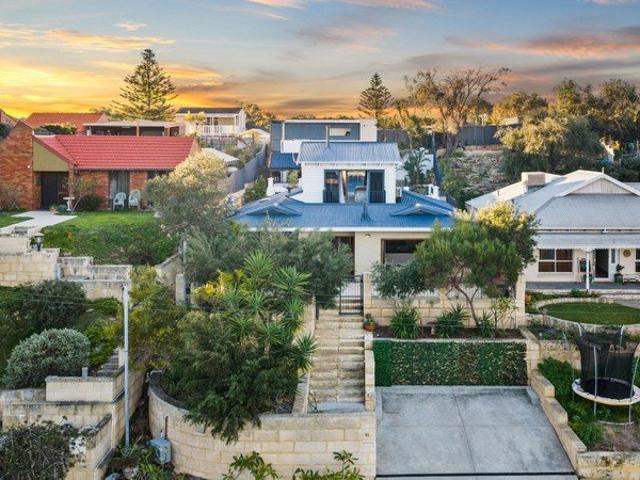 ELEVATED COASTAL LIVING!