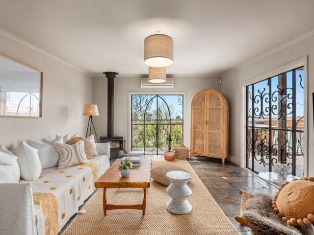 Elevated Coastal Living with Mediterranean Soul