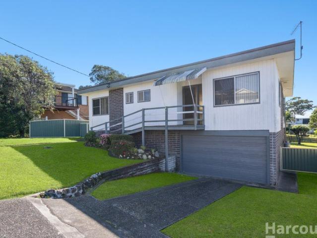 Elevated Coastal Living with National Park Views, Wrap Around Deck & Flexible Three Bedroom Design