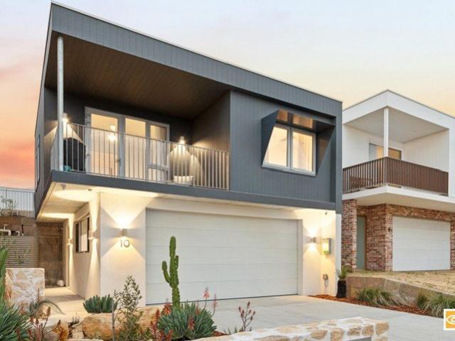 ELEVATED COASTAL LIVING WITH OUTSTANDING ENERGY EFFICIENCY