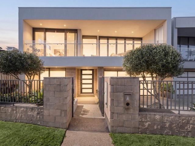 Elevated Coastal Living with Bay Views