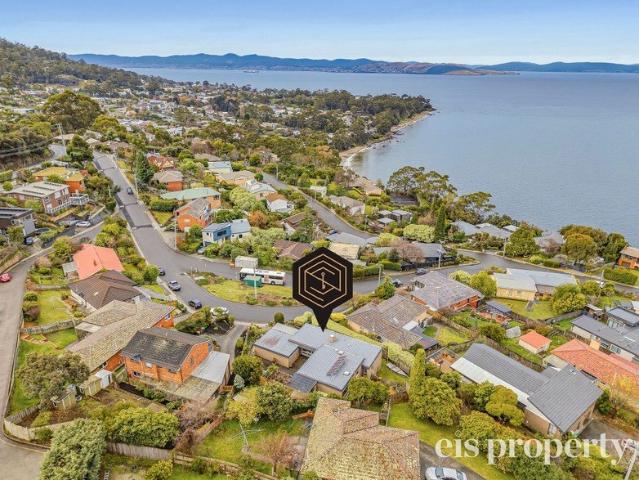 Elevated Coastal Living with Breathtaking Water Views & Flexible Family Accommodation