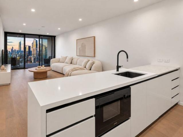 Elevated Coastal Living with City and Water Views
