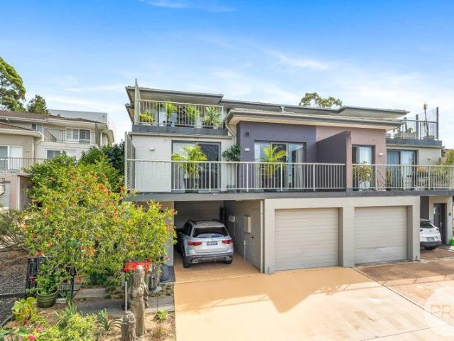 Elevated Coastal Living with Expansive Entertaining and Leafy Outlook