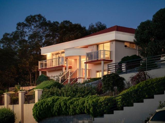 Elevated Coastal Living with Panoramic Water Views