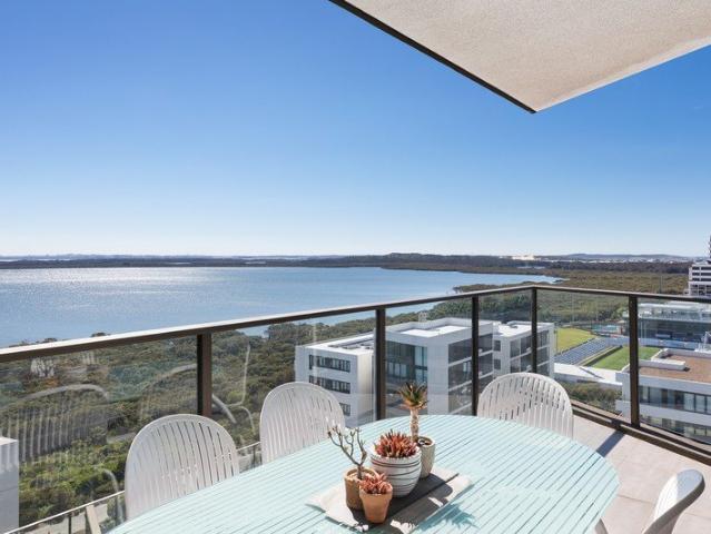 Elevated Coastal Living with Panoramic Water & City Views