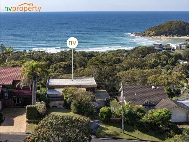 Elevated Coastal Living with Panoramic Ocean Views
