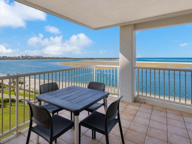 ELEVATED COASTAL LIVING WITH SWEEPING WATER & CBD VIEWS