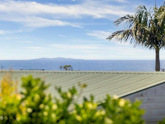 ELEVATED COASTAL LIVING WITH VIEWS TO MONTAGUE ISLAND