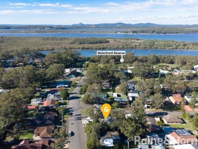 Elevated Coastal Living with Water Glimpses, Dual Accommodation & Endless Lifestyle Appeal