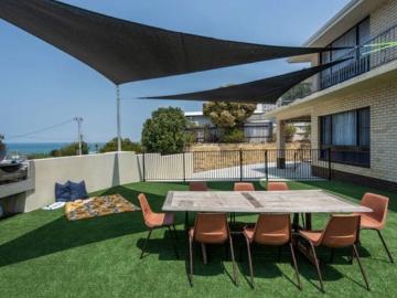 Elevated Coastal Living Renovated, Furnished & Ready to Enjoy