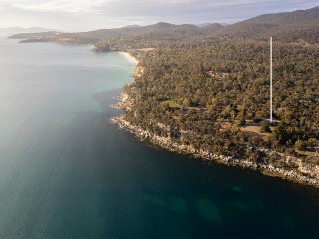 Elevated above the coast. Immersed in tranquillity