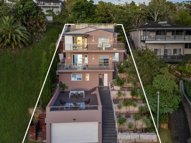 Elevated coastal residence with ocean views and exceptional dual living flexibility