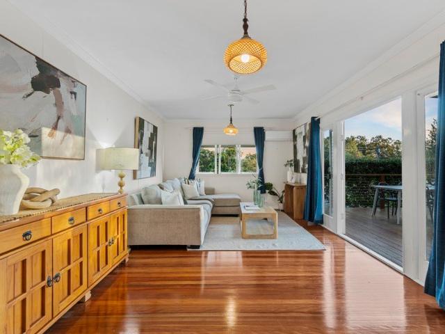 Elevated Corner Block Home with Plenty of Potential