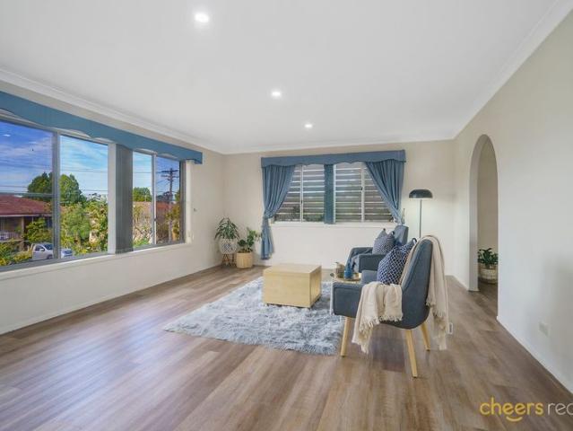 Elevated Corner Gem in Macgregor School Catchment!