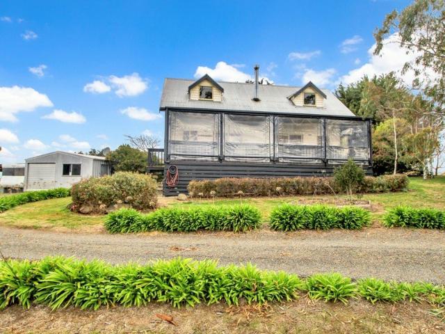 ELEVATED COUNTRY CHARM WITH SPECTACULAR VIEWS
