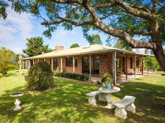 ELEVATED COUNTRY LIVING WITH UNINTERRUPTED VALLEY VIEWS, SPACE & SOUL