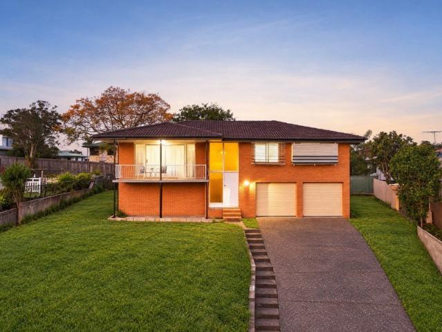 Elevated Cul de Sac Home with a Balcony View You'll Want to Keep
