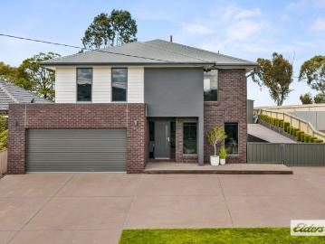 Space, Warmth & Views A Home Where Family Life Falls Into Place