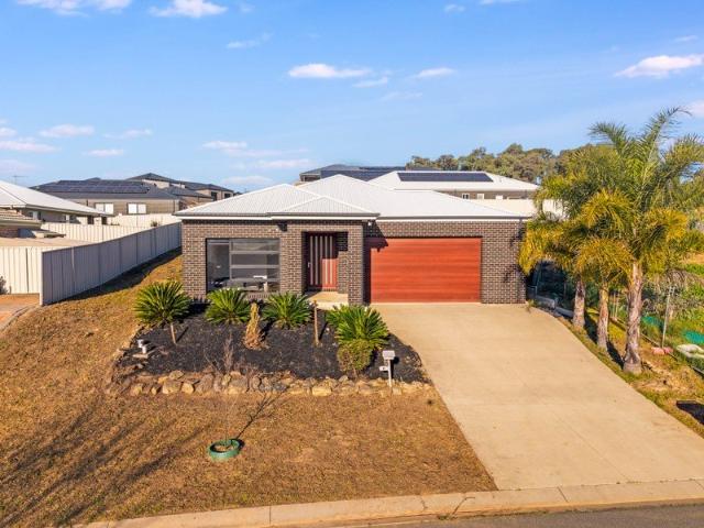 Elevated Executive Living with Exceptional Views!