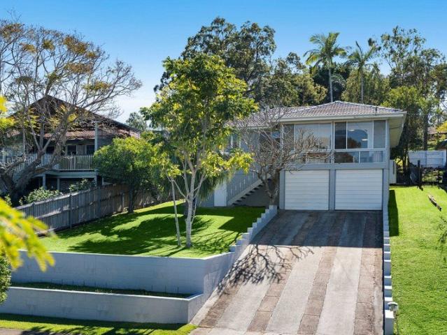 Elevated Family Charm with a North Facing Backyard