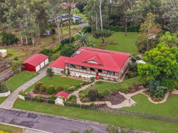 Elevated Family Acreage Living with Stunning Views, Pool & Extensive Shedding