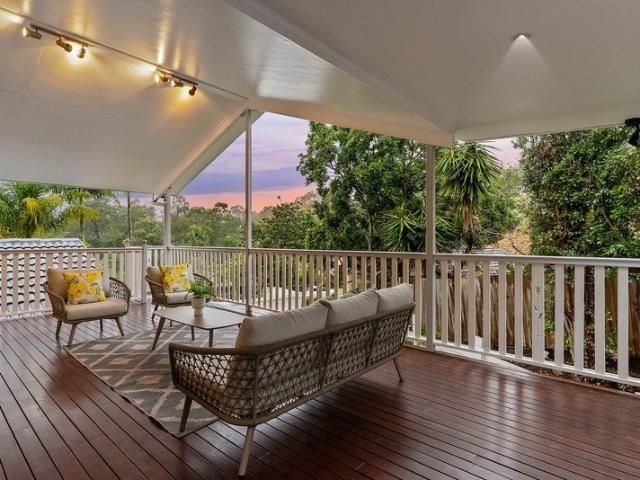 Elevated Family Entertainer with Multiple Living Zones, Fresh Updates & Leafy Outlooks
