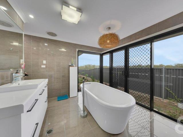 Elevated Family Entertainer with Spectacular Views and a Large Shed!