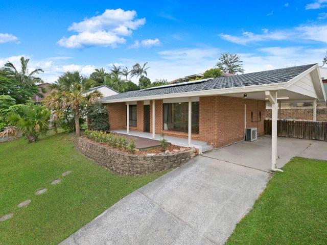 Elevated Family Home with Pool in a Quiet Ashmore Pocket
