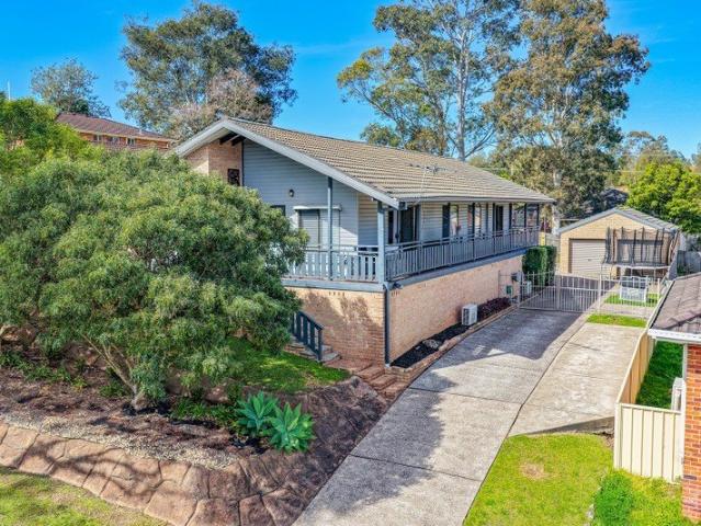 ELEVATED FAMILY HOME WITH SPACE, VIEWS & POTENTIAL!