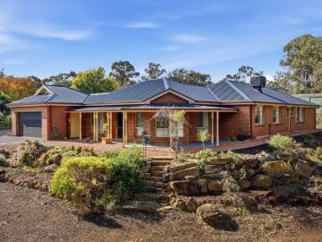 Elevated Family Living on Over an Acre in Popular Robin Hill Estate