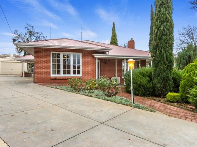 Elevated Family Living on a Generous Allotment in Sought After Clare