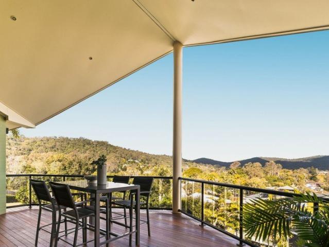 Elevated Family Living Framed by Panoramic Mountain