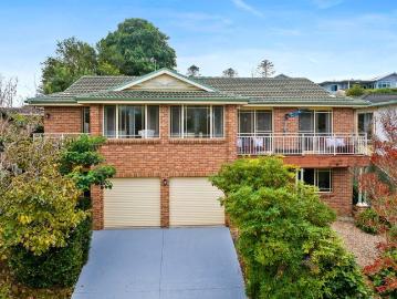 Elevated Family Living in Highly Sought After Coastal Locale
