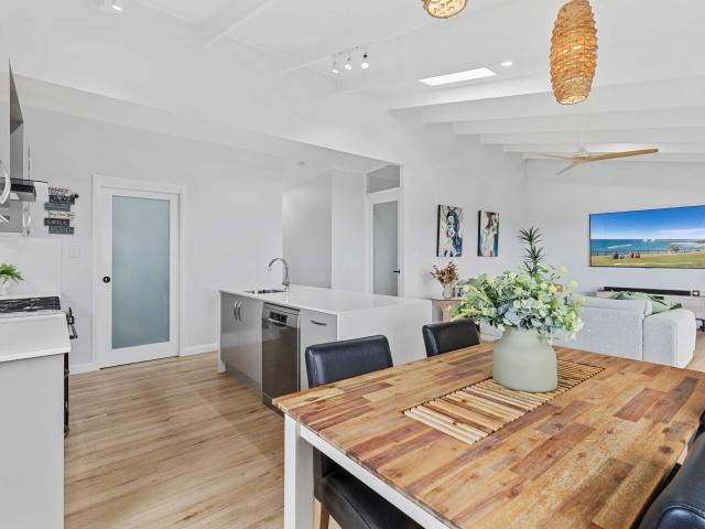 Elevated Family Living in Sought After Highland Park