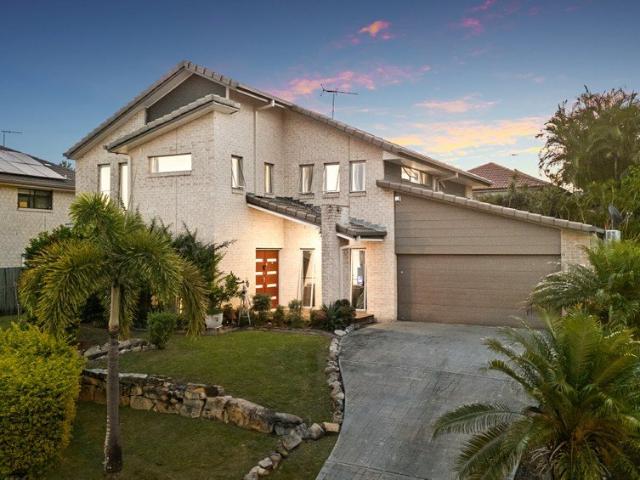 ELEVATED FAMILY LIVING IN THE HEART OF SPRINGFIELD LAKES