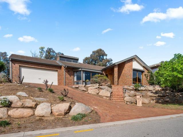 Elevated Family Living with Coastal Views & Endless Potential