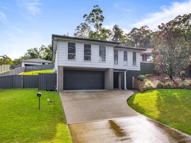 Elevated Family Living with Bushland Views in a Quiet Cul de Sac