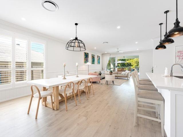 ELEVATED FAMILY LIVING WITH GENEROUS SPACE, PRIVACY, MULTIPLE ENTERTAINING AREAS, HEATED POOL AND GATED SIDE ACCESS!