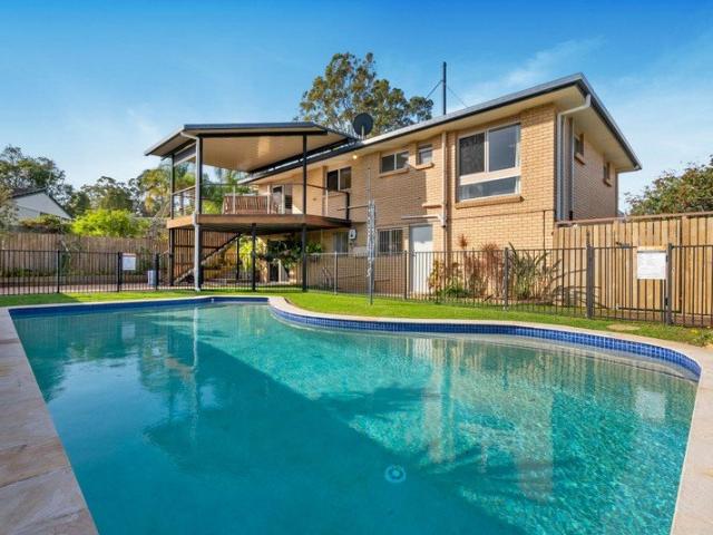 Elevated Family Living with Green Outlook, Pool & Exceptional Space